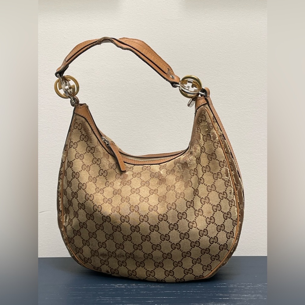 Gucci Monogram Hobo with hood and silver hardware